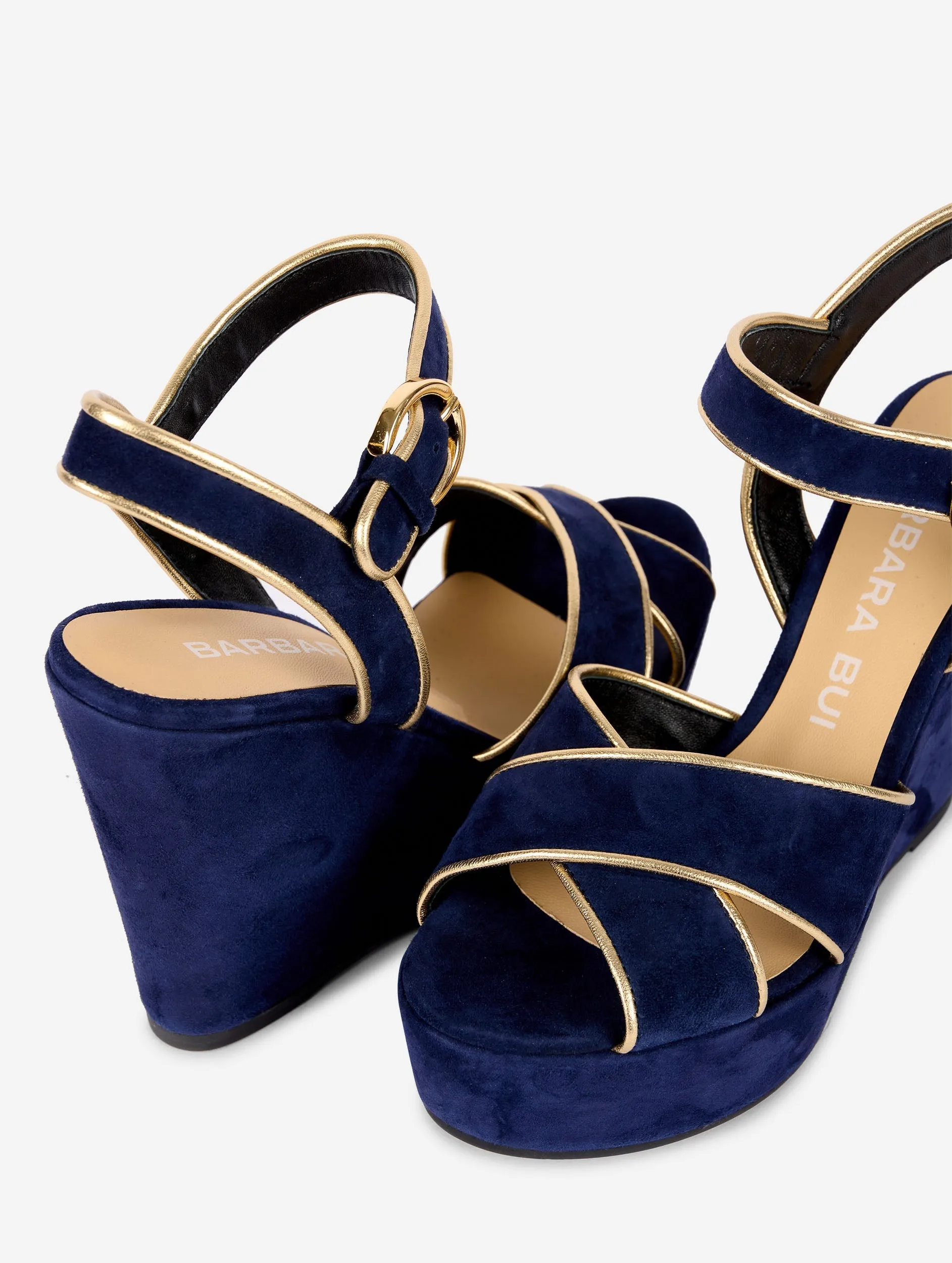 wedge sandals in gold-trimmed navy suede